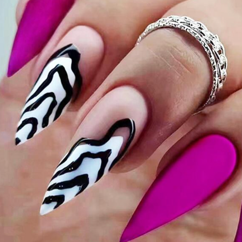 stiletto bright purple nails with black and white swirl accent nails