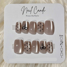 Load image into Gallery viewer, Nail Candi press-on nails with designs on a white card
