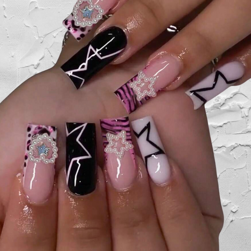 Medium square black and pink nails with star design and charms