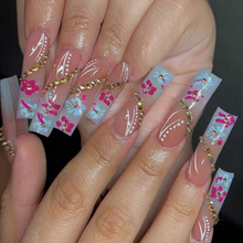 Load image into Gallery viewer, Bright blue and pink flower nails with rhinestone design
