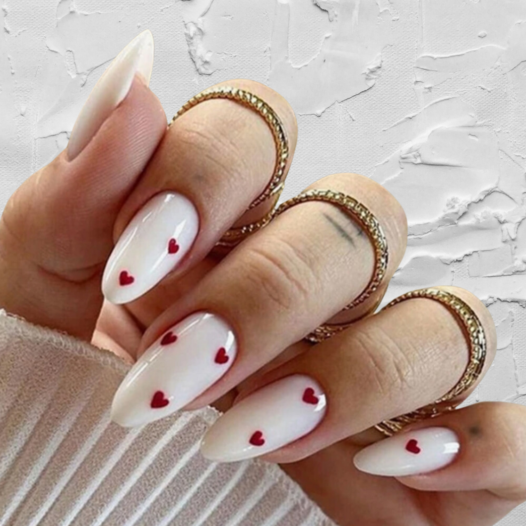 medium length white nails with red hearts. medium white valentines day nails