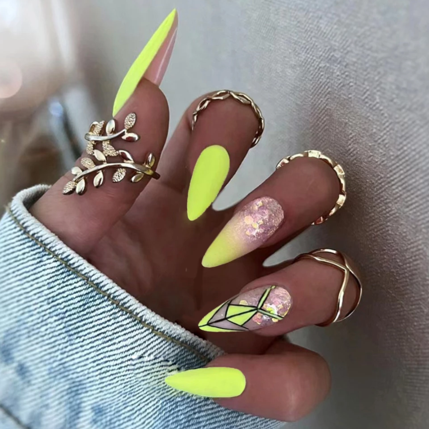 Long matte neon yellow stiletto nails with black abstract line design. press ons neon yellow