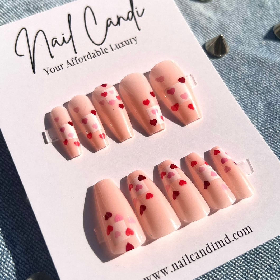 Long coffin shape nails pink with red and dark pink hearts 