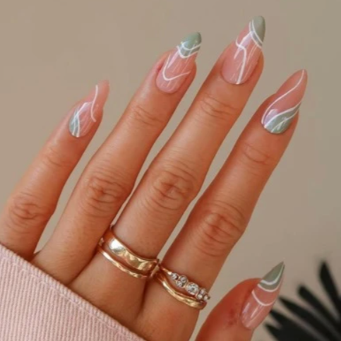 Medium length glossy almond shape fake nails with sage green and white swirls press on nails