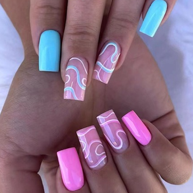 Blue and pink solid nails with blue pink and white swirl accent nails